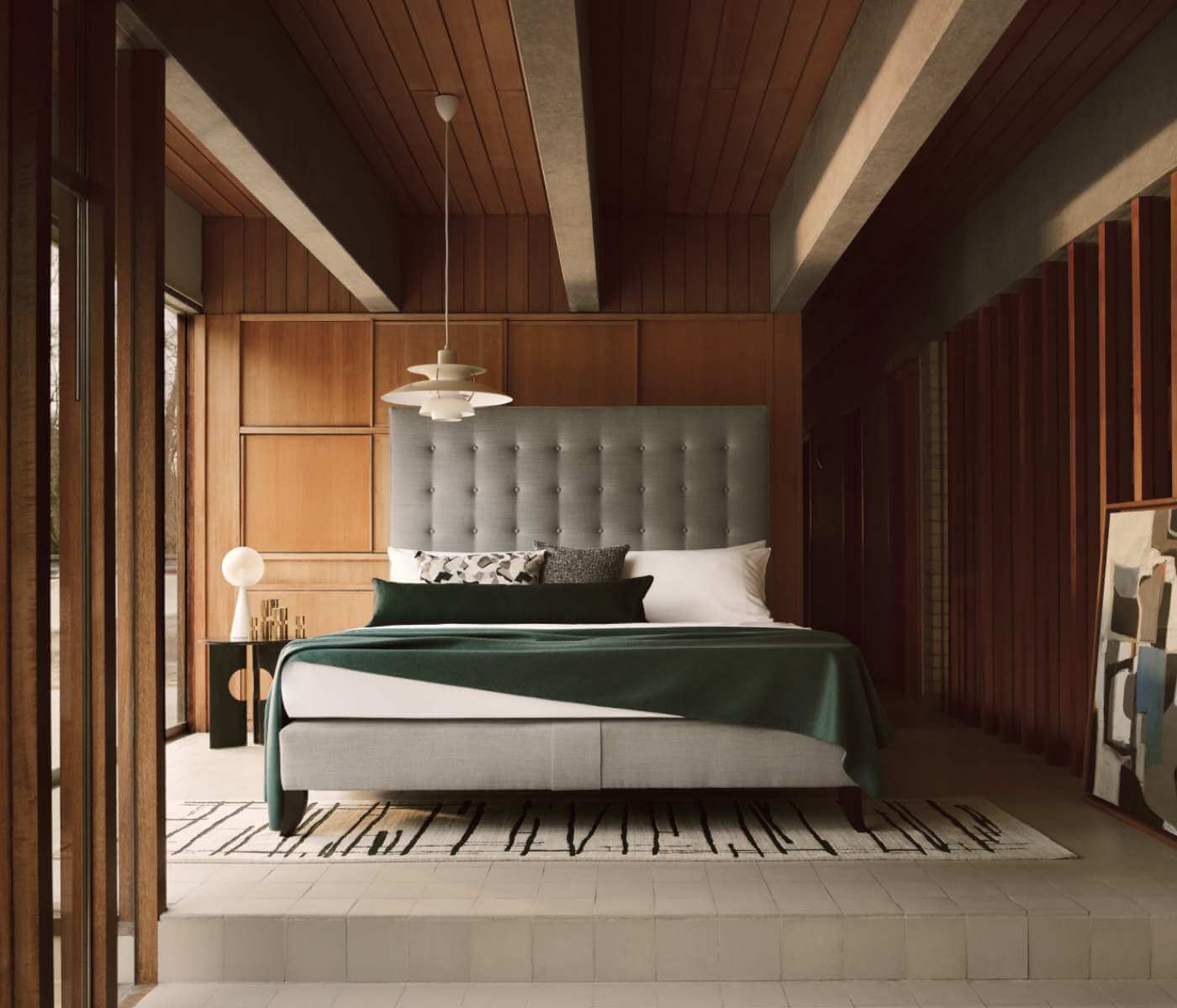 Holly Design, upholstered in organic grey linen and photographed at the mid-century-modern Ahm House in UK