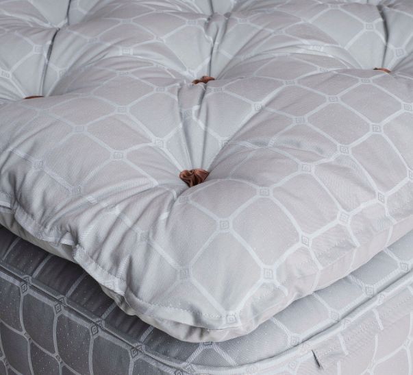 Savoir beds close up of our topper on top of our mattress no3. Our bed set no3