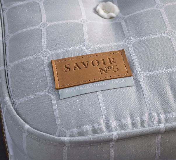 The Savvy bed no5 with the mattress label