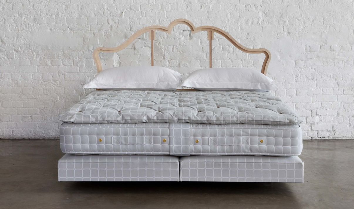Savoir bed featuring the vegan bed set no4 with the mattress, the base and the topper