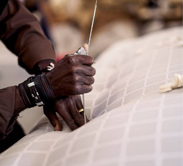 A Savoir Beds no4 mattress filling is then encased in Trellis ticking and hand tufted