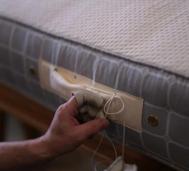 Our number 01 Savoir mattress with handle handmade by a craftsman